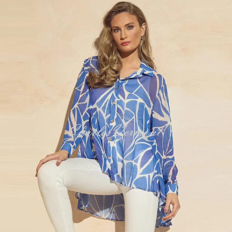 Frank Lyman Patterned Blouse With High-Low Hem - Style 241352U Feminine Ruffle Blouse Frank Lyman Patterned Blouse With High-Low Hem - Style 241352U Feminine Ruffle Blouse