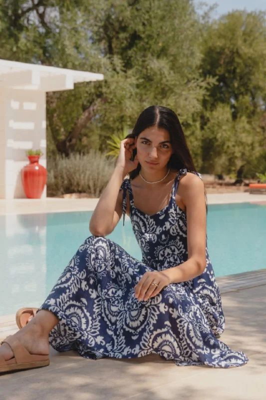 Nimbus Navy Tile Print Strappy Tiered Maxi Dress Trendy Off-Shoulder Ruffle Maxi Dress Nimbus Navy Tile Print Strappy Tiered Maxi Dress Trendy Off-Shoulder Ruffle Maxi Dress